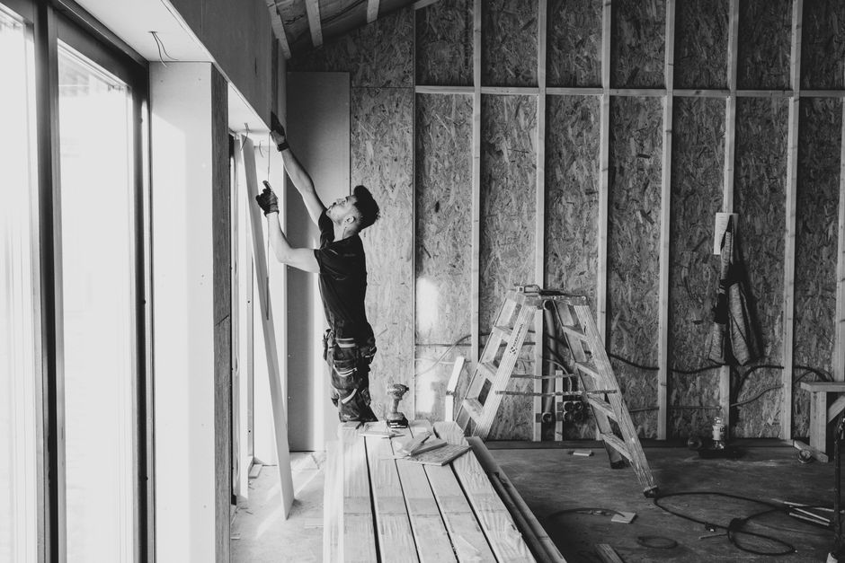 Professional contractor performing high-quality window installation