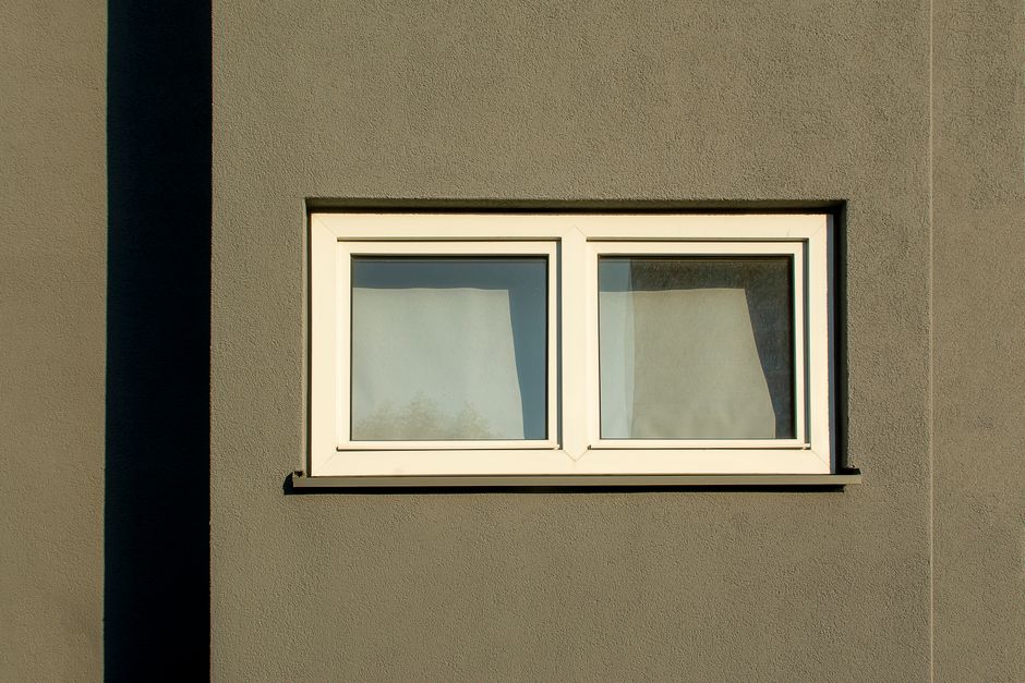 Clean white window frame demonstrating expert window installation